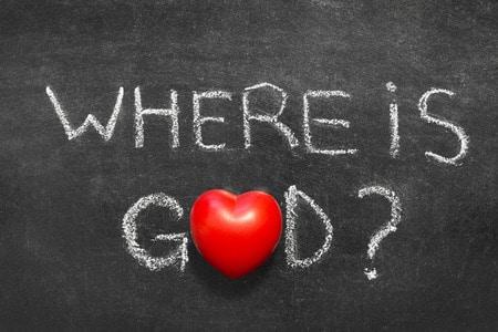 where is god question handwritten on chalkboard with red heart symbol instead of o